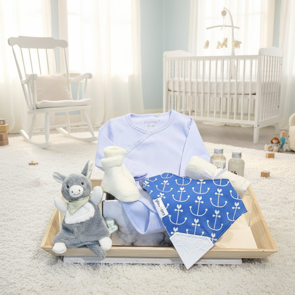 baby gift with bodysuit, socks, bib, bambou washcloth, kaloo push toy and soap and bubble bath